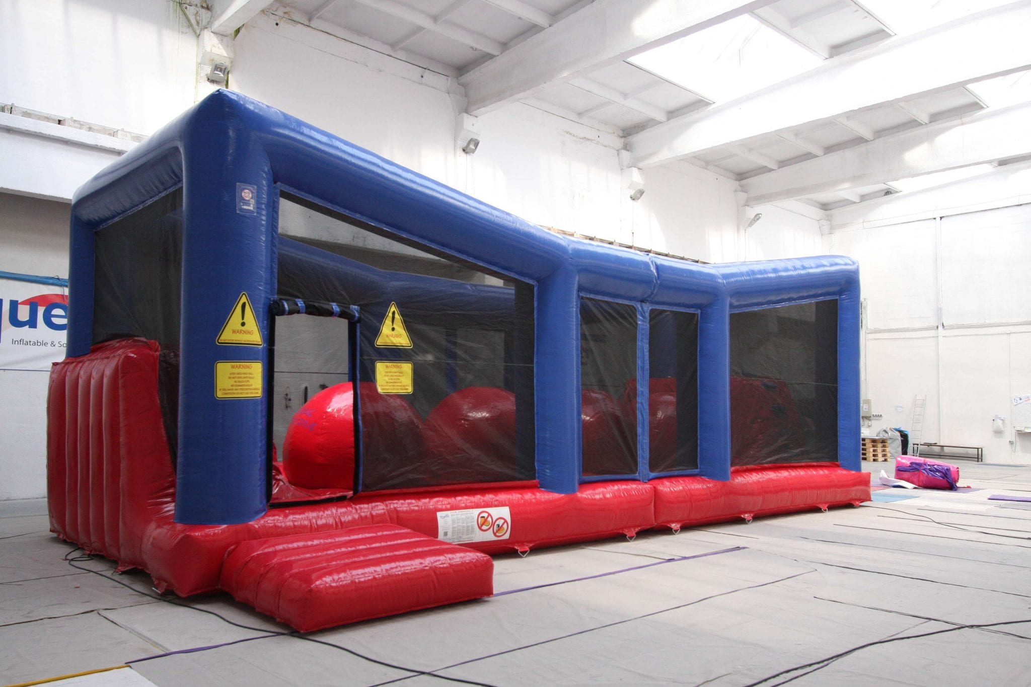 Big Red Balls Wipeout Inflatable Game Hire Fun4Events 01945 465566