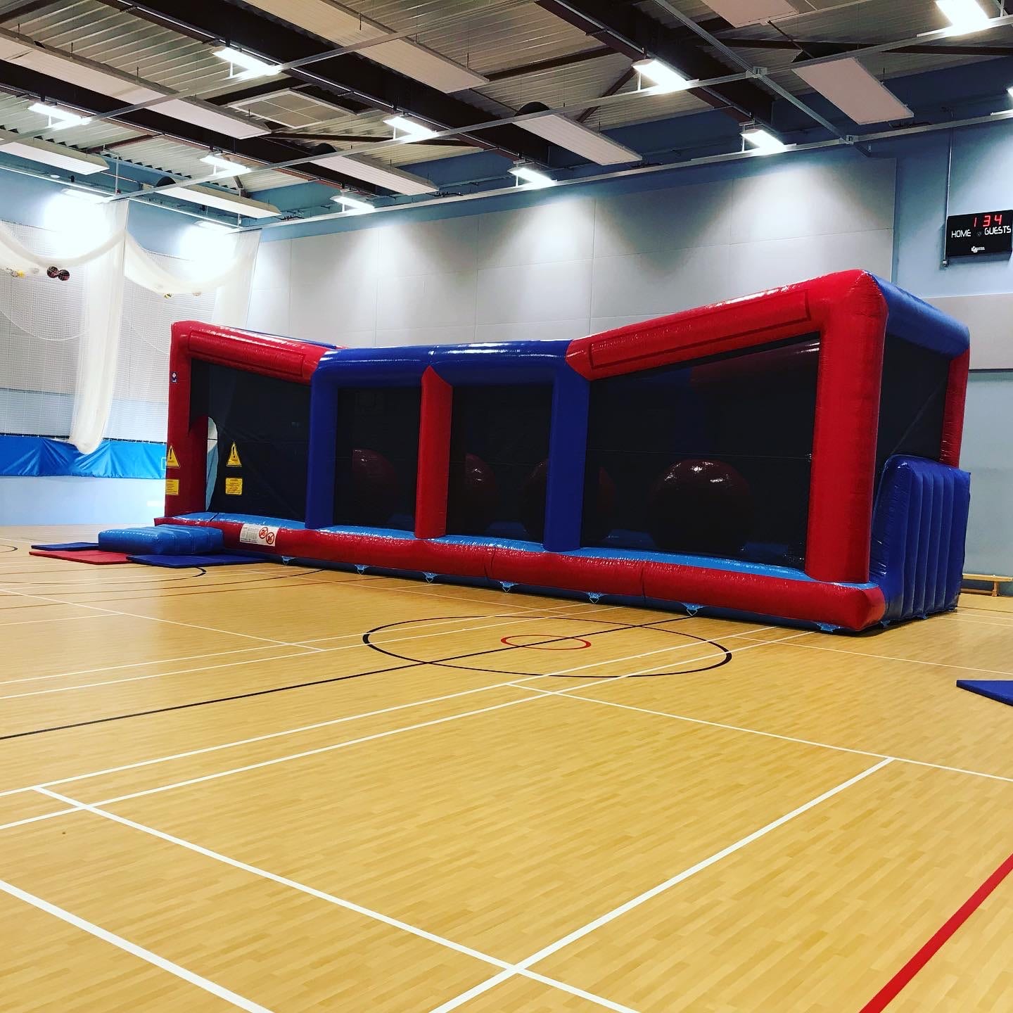 Big Red Balls Wipeout Inflatable Game Hire Fun4Events 01945 465566